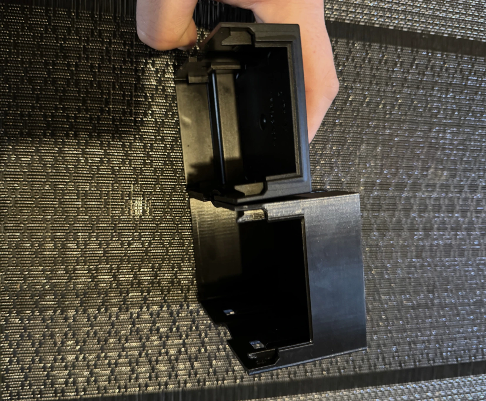 Obsolete discontinued plastic component alongside its 3D-printed replacement